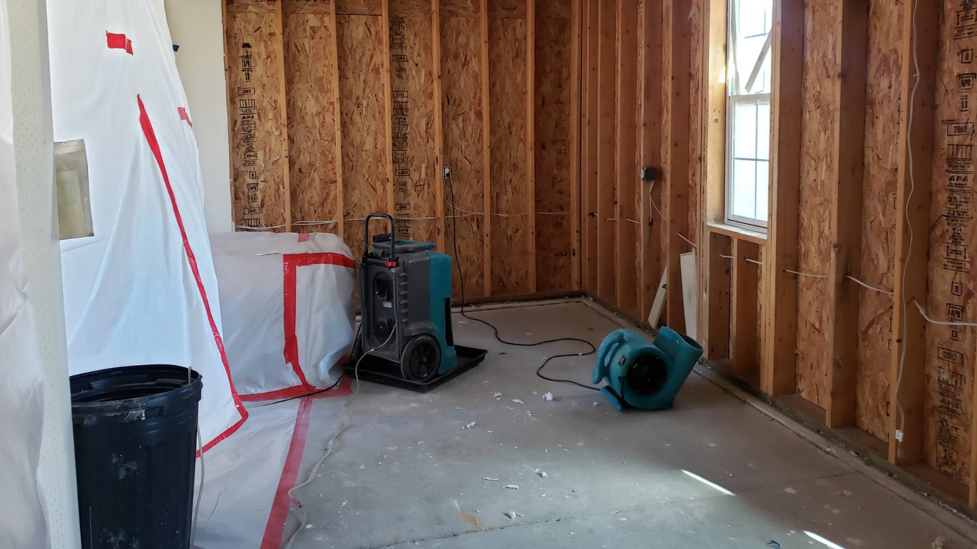 Emergency water extraction in a Vancouver home after heavy rain